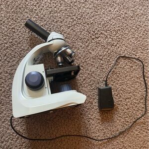 Compound microscope powered by a cord